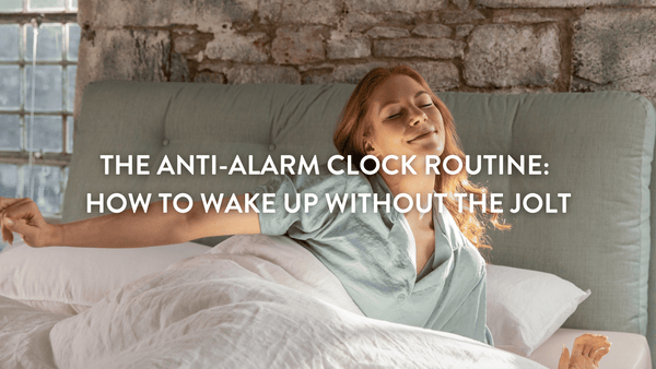 person waking up naturally without an alarm clock with sunlight on their face