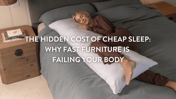 Person sleeping in bed using a Putnams Body Pillow