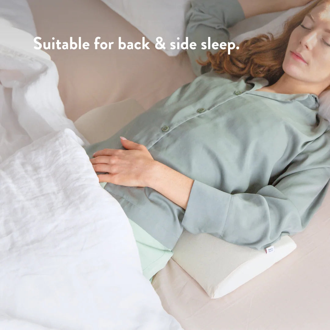 Bed Back Support Pillow - Putnams Place this D shaped firm pillow under the small of your back to support the natural S shape of the spine during sleep. Gives pressure relief to the back when in pain.