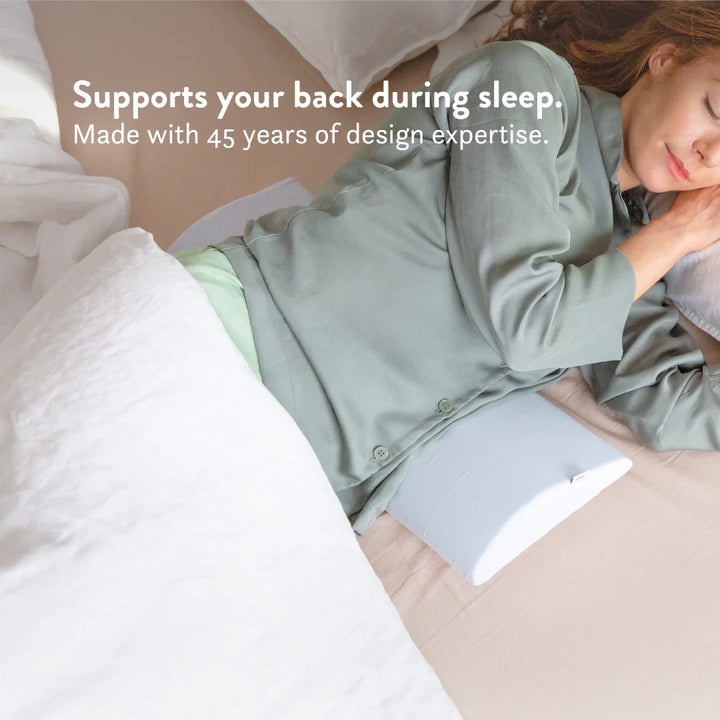 Bed Back Support Pillow - Putnams Place this D shaped firm pillow under the small of your back to support the natural S shape of the spine during sleep. Gives pressure relief to the back when in pain.